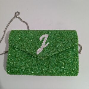 Island to East Side "J" Green Glitter clutch